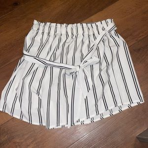 High wasted white and black pinstripe shorts. Size small.